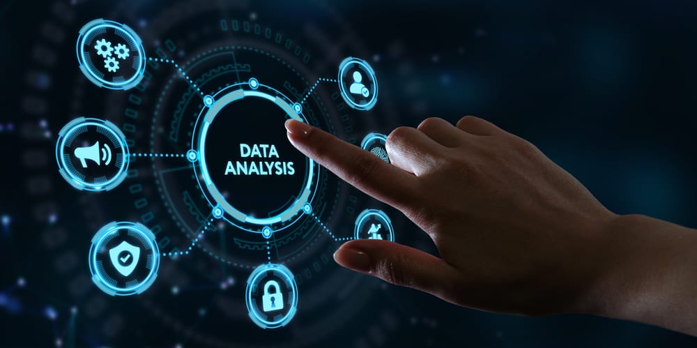 Finger pressing a digital screen showing data analysis icons