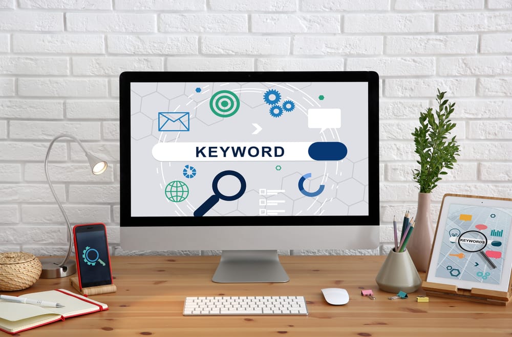 keyword in search bar on monitor at lawyer desk