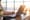 Female attorney creating content for Law firm on a laptop